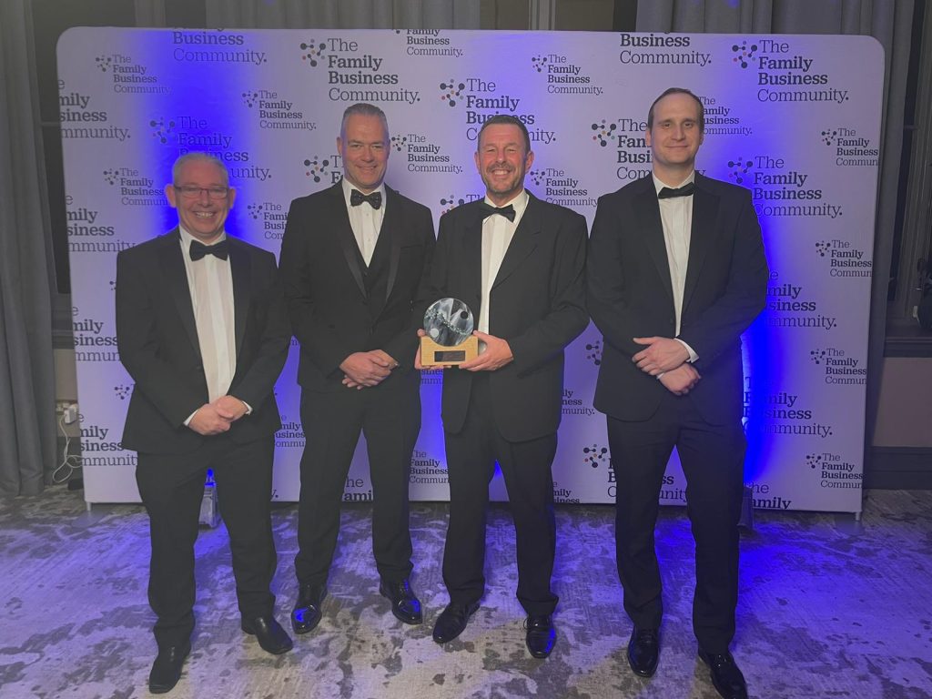 The TEPS team with their trophy at the Yorkshire & Humberside Family Business Awards after winning the Haulage Transport & Logistics category.